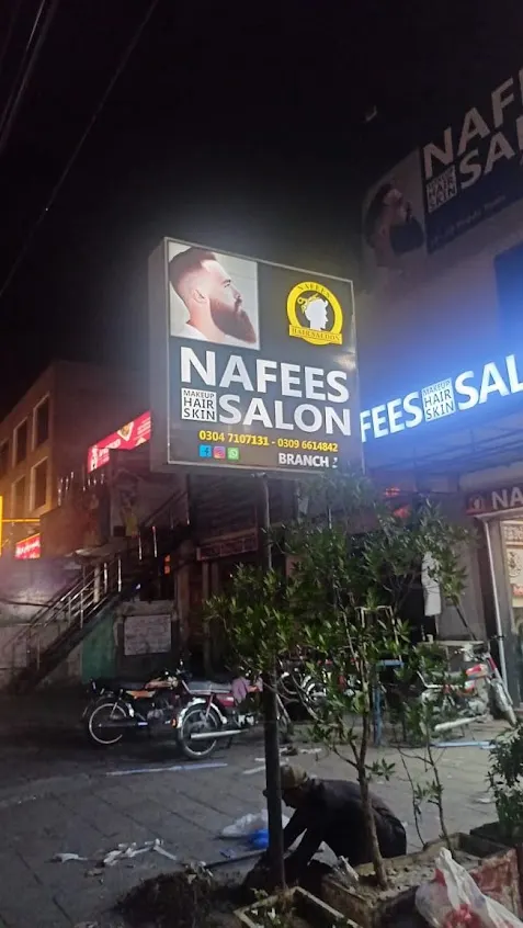 Haircut in progress at Nafees Hair Saloon